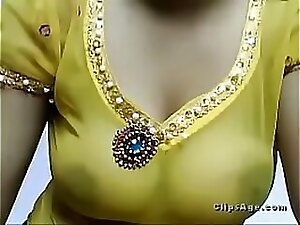 Indian teen dildo fun: Desi cutie undresses, then teases with a toy, leaving her white shirt barely covering her perky breasts.