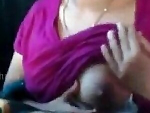 Sensual Indian beauty with big tits shows off her cooking skills.