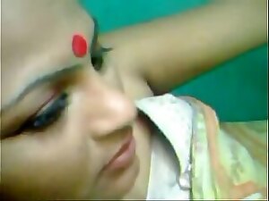Bengali older woman craves sex on a bare bedsheet.