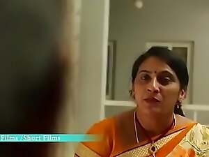 Telugu aunty enjoys cooking and sex, leading to steamy lessons with eager students.