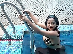 Bhabhi's energized swim leads to a steamy encounter, showcasing her ample breasts in a passionate, intimate video.